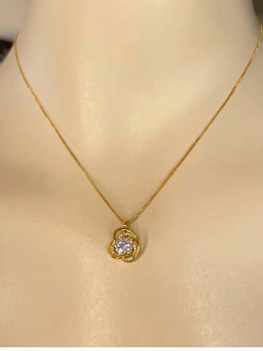 Fifth Avenue Interlocking Knot  CZ Gold Tone Pendant Necklace